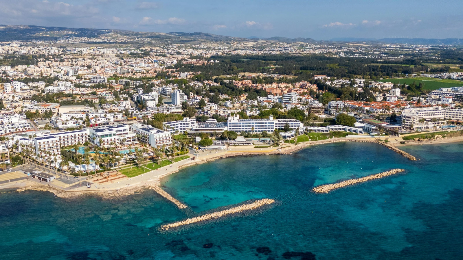 comprehensive aerial view of Paphos city and coastline for road trip planning